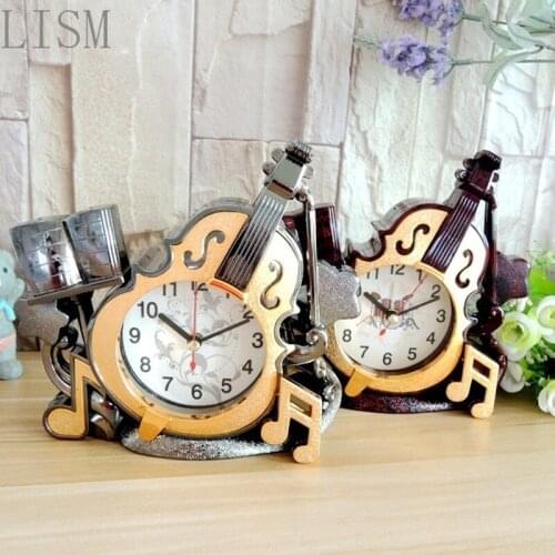 Home accessories export commodities Qiqu retro cello alarm clock photographic equipment company gifts