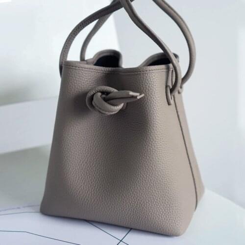 Womens bag new leather shoulder portable bucket bag trendy fashion Joker retro niche design advanced