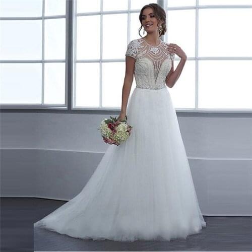 Jewel Short Sleeves Beading Lace Appliques A-Line Wedding Dresses Sexy Open Back Tulle Skirt Beautiful 2020 Bridal Gowns Bling