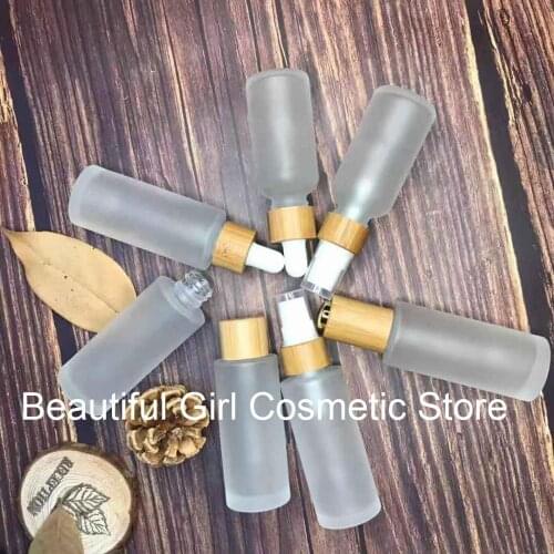 New 30ml 50ml Skincare Lotion Cream Empty Cosmetic Packaging bamboo pump Bottle,nature cbd recycled refill frosted glass bottle