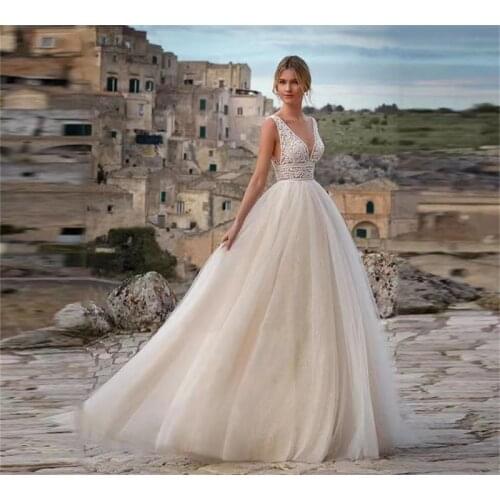 9959#Vintage V-Neck Boho Wedding Dresses Backless Glitter Tulle A-Line Beach Bridal Gowns Illusion Lace Sleeveless Bride Dresses
