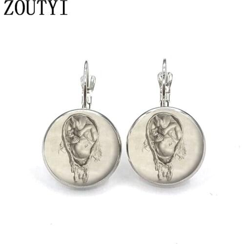 New / glamorous Da Vinci fetus painting art pattern photos, convex glass inlay earrings, feminine decoration
