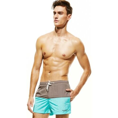 2018 New surfing beach shorts man summer striped quick dry shorts swim trunks with mesh pockets drawstring boardshorts