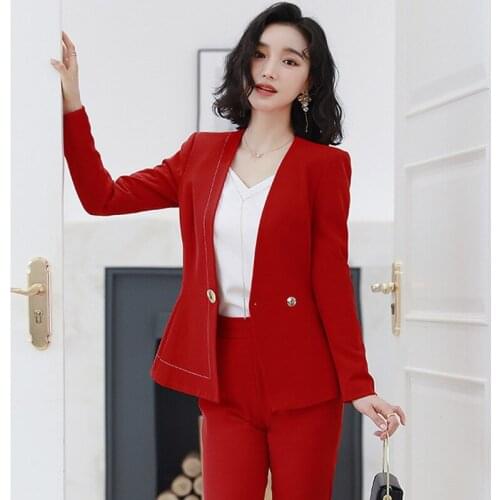 Ladies suits autumn and winter new fashion wild temperament one buckle West decoration body trumpet trousers womens two-piece