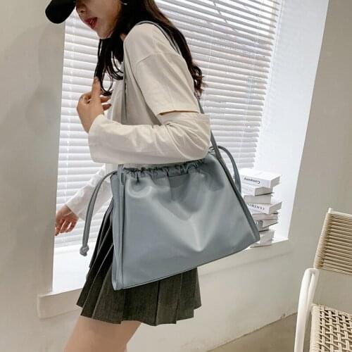 Simple casual drawstring bucket bag fashion trend womens one-shoulder portable tote bags small fresh trendy all-match handbag