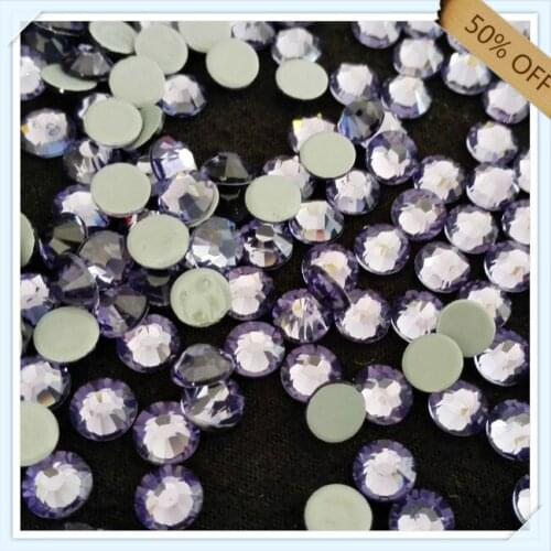 Austrian crystal free shipping new glue size ss16 4mm TANZANITE color with 1440 pcs each pack ; diamond stone for DRESSES