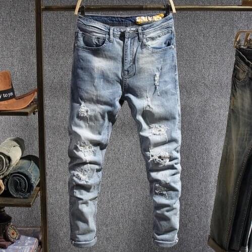 Korean Style Men Jeans Retro Light Blue Elastic Slim Ripped Jeans Men Street Fashion Patches Printed Designer Denim Pencil Pants