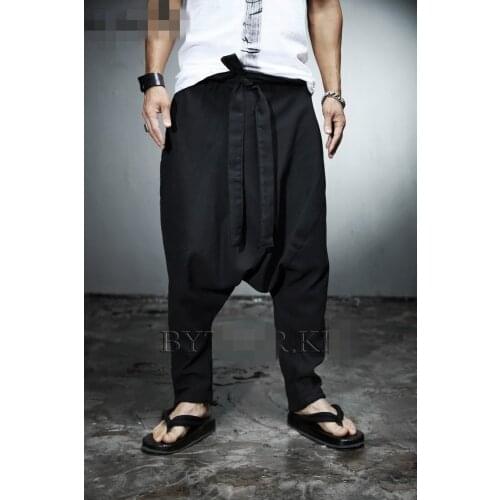 Korean youth hip hop mens low crotch fashion trend lace up casual pants Harem Pants linen pants loose personality