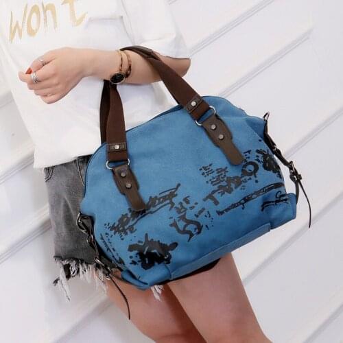 The new 2020 fashion all-match street canvas bag trendy casual travel bag portable hit color large bag womens shoulder bag