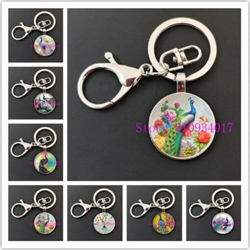 Fashion beautiful peacock feather photo round glass pendant keychain handmade peacock jewelry gift male and female keychain