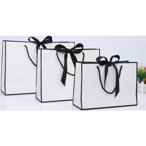 100pcs Creative design Black border White kraft paper bag with handle Wedding Party Favor bowknot Paper Gift Bag Custom logo SN