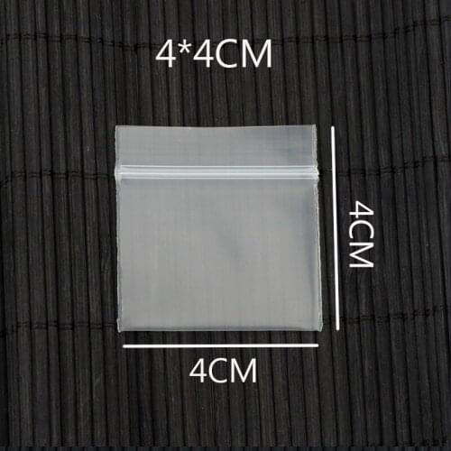 100Pcs 4cmx4cm /1.57inch x 1.57inchTransparent Jewelry Pill Pearl Powder Hermetic Bag Zip Lock Plastic Gift Packaging Bags