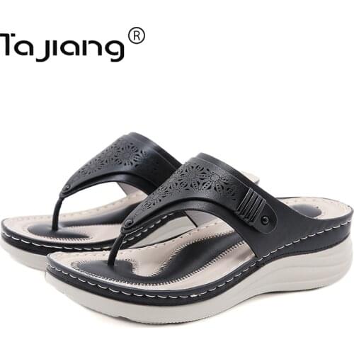 Ta Jiang New thick-soled slope heel slippers European and American fashion hollow summer female gladiator beach slippers T777-1