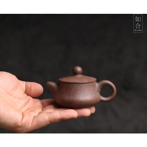 Lin Nanyous hand-held teapot Chaozhou specialty raw mineral vermilion clay small teapot