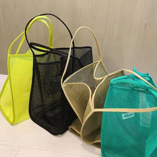 Womens 2021 New Ins Wind Transparent Mesh Single Shoulder Bag Fashionable Lightweight All-match Shopping Bag Beach Net Bag