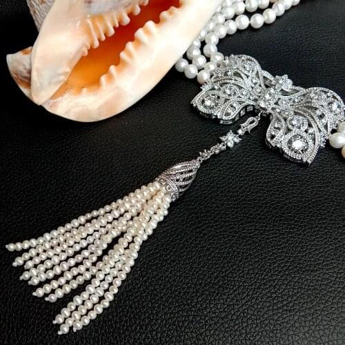 YYGEM 3 Strands Cultured White RoundFreshwater Pearl Bowknot Shape Cubic Zirconia Pave Pear Tassel Pendant Necklace