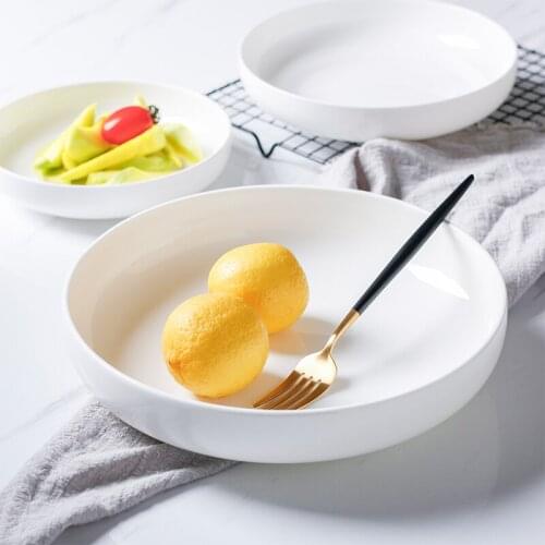 Japanese style white simple ceramic disc creative round ceramic soup plate deep dish salad plate home baked rice steamed eggs