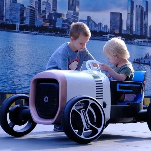Childrens electric car concept car baby childrens electric four-wheeled can sit on a double 2-wheel drive off-road vehicle