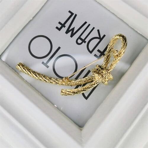 Glorious new alloy plating new world Europe and the United States jewelry antique aerodynamic bowknot female spot