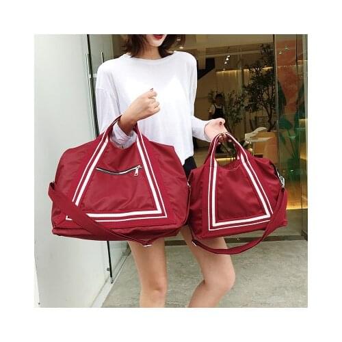 2020 women and men Korean fashion big bags hit color large capacity folding travel bags portable sports fitness bag