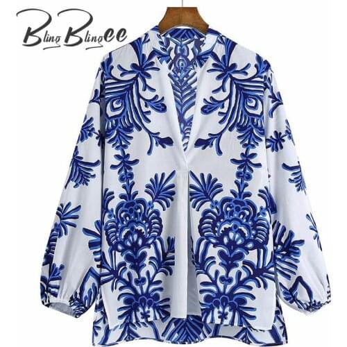 BlingBlingee Summer Fashion Blue Floral Print Loose Blouses Folds Front Deep V Slit Side Women Casual High Low Tops Female