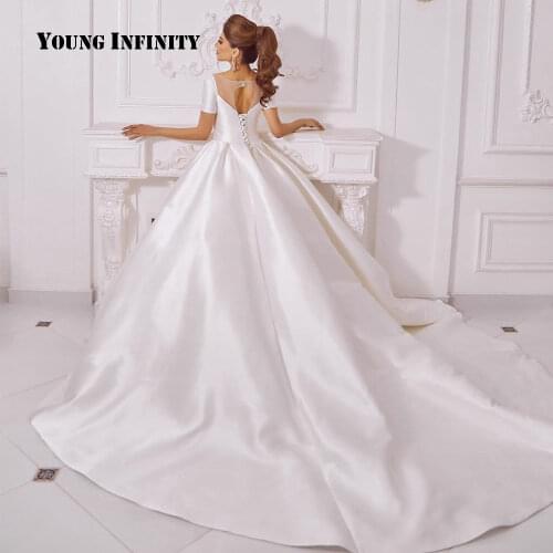 Elegant Satin Ball Gown Wedding Dress 2020 Short Sleeves Bridal Gown Keyhole Back Chapel Train Dubai Custom made Large Size