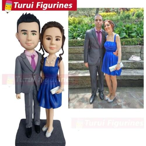 Personalized sculpture copied from photograph wedding cake topper custom bobblehead for wedding couple bride and groom cake topp