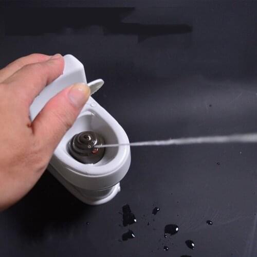 Novel interesting poop spray prank toy joke cary toy mini sprinkler toilet spray gun simulation toilet toy