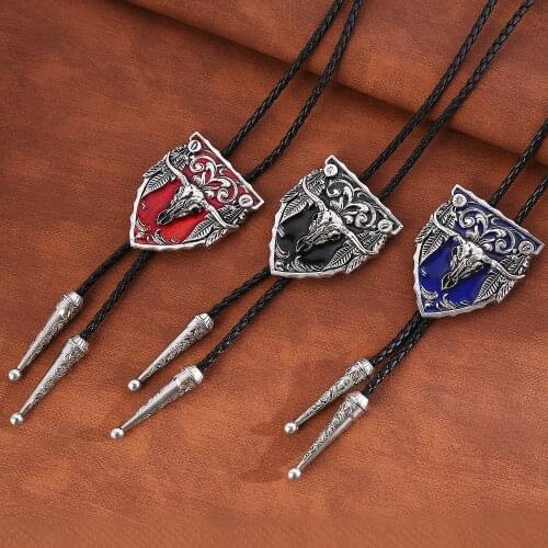 Big cow head western cowboy Tang grass pattern bolo tie leather fashion pendant men and women bolo tie tie rope tide