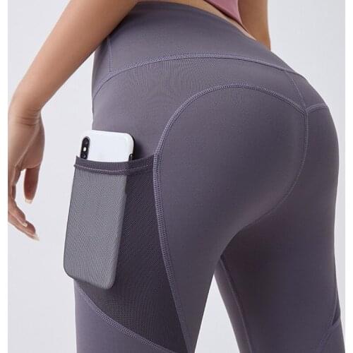2021 New Womens Tight-fitting Hip Leggings Quick-drying High-waist Stretch Mesh Side Pockets Running Sports Fitness Pants
