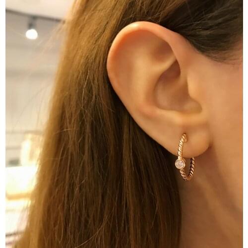 STELA DESIGN AUGER EARRINGS