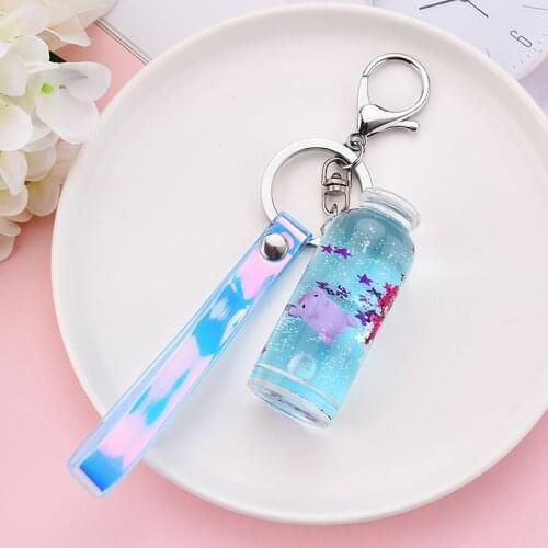 New Cute Cartoon Floating Pig Mini Bottle Keychain Color Laser Wristband Key Rings Colorful Liquid PVC Bottle Car Key Pendant