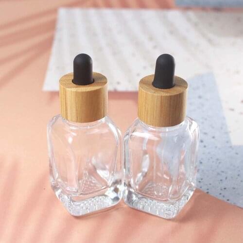 Empty glass clear 35ml dropper bottle with bamboo lid