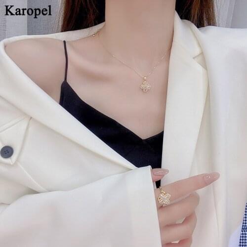 Karopel Rotating Four-leaf Clover Womens Ring Micro-inlaid Zircon, Exquisite Small Fresh Temperament Necklace Ring