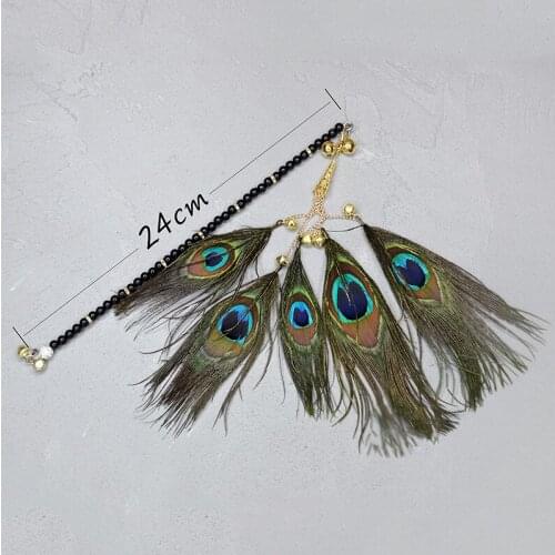 A pet makes cat stick toy a rainbow ball a bell makes stick feather cat toys interactive Peacock feathers cat toys