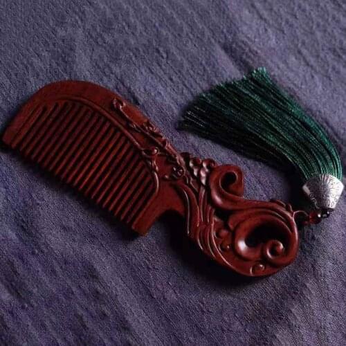 Manufacturers directly for red sandalwood carving Yunhai Youlan pattern comb whole wood polishing wood craft gift comb decor