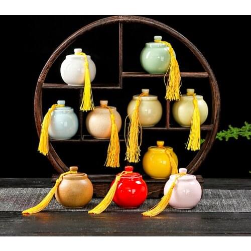 Hot selling hot style mini urn China souvenir cat dog bird ash round solid color ceramic art animal cremation daily necessities