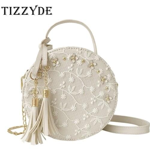 Lace Embroidery Small Round Bag 2019 New Korean Fashion Womens Bag Round Shoulder Diagonal Hand Tassel Bag Female YQ0369
