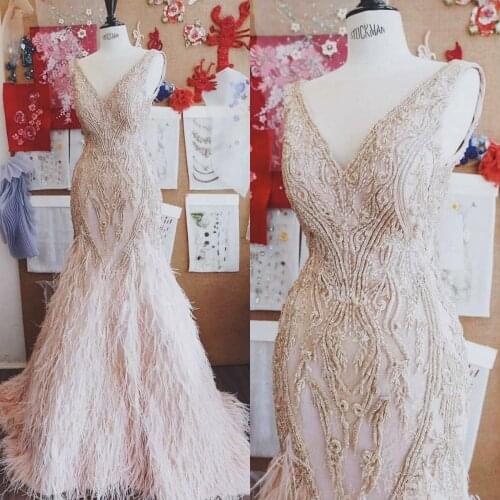 Arabic Luxurious Feather Beaded Prom Dresses Mermaid Deep V Neck Evening Gowns Sweep Train Crystal Formal Party Pageant Dress