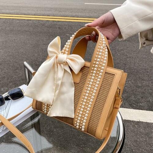 New Pearl Fashion Straw Bag Hand-Woven Shoulder Bag Seaside Vacation Designer Handbag Famous Brand Women Bags 2021