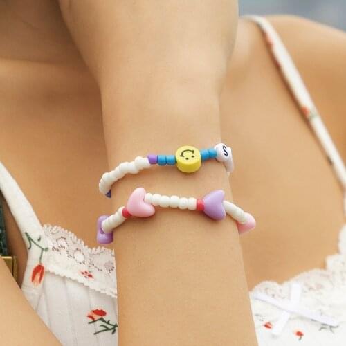 Pastoral Fashion Acrylic Color Smiley Rice Bead Bracelet Europe and America Retro Love Imitation Pearl Soft Ceramic Bracelet Set