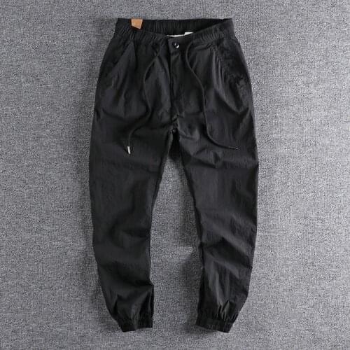2021 Natural fold fresh quick drying elastic loose Leggings breathable comfortable sports casual pants mens trouser 254