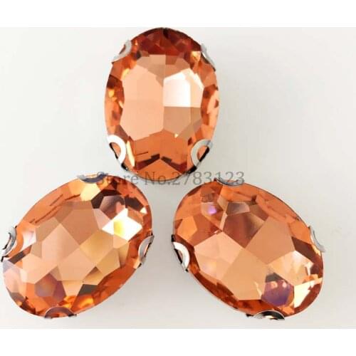 High-quality Glass Crystal oval water red color flat back sew on rhinestones with Silver claw Setting For Dresse