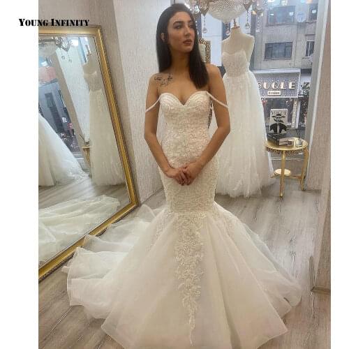 Romantic Mermaid Wedding Dresses 2021 Sleeveless Bridal Gown Backless Sweetheart Chapel Train Applique White Plus Size Bride