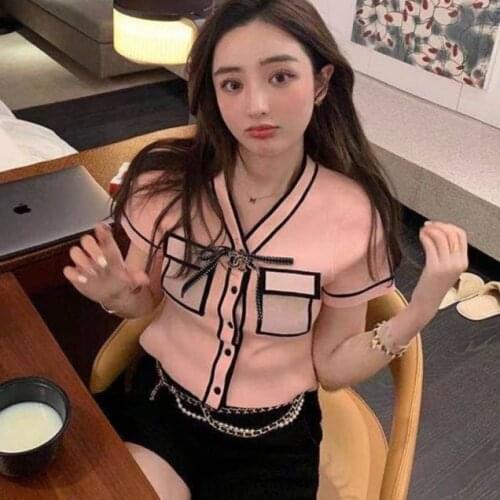 The new spring and summer DoggyQin xiang xiang knitting/female color matching design feeling joker coat sweater with short sleev