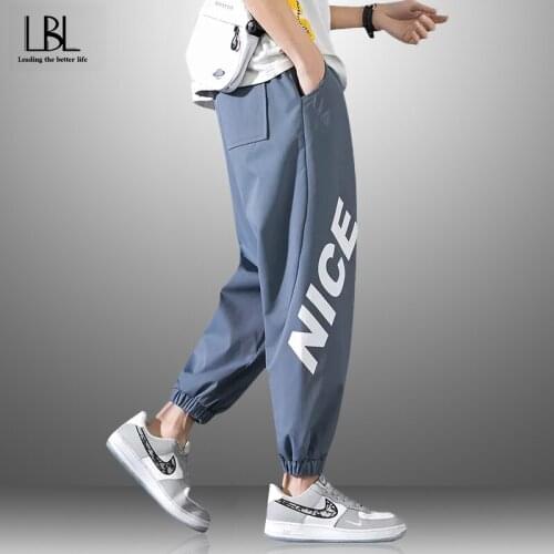 Men Breathable Harem Pants 2021 New Male Fashion Casual Loose Trousers Mens Letter Printting Pockets Sweatpants Spring Autumn