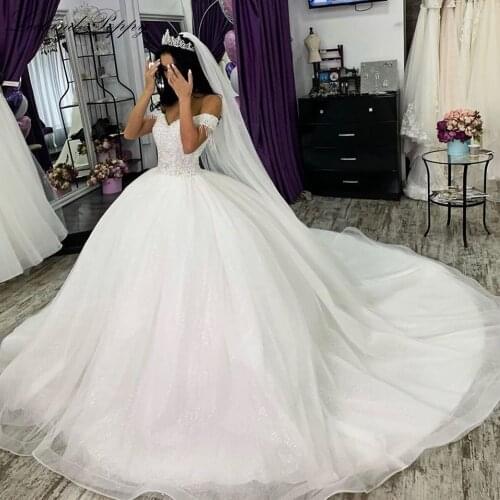 Lceland Poppy Womens Off the Shoulder Ball Gown Wedding Dresses 2021 Shiny Tulle Floor Length Beaded Plus Size Bridal Dress