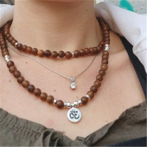 WWLB Charm 108 Wooden Beads Buddhism Flower Of Life OM Lotus Necklace for Women Men Rosary Necklace Vintage Prayering Jewelry
