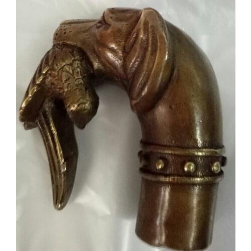 China old handmade bronze sculpture of an Indonesian man walking stick