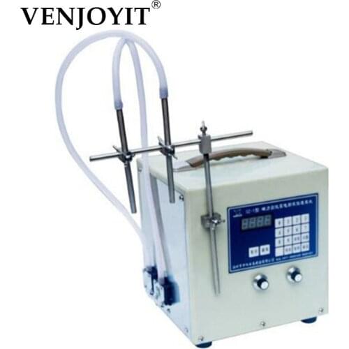 Liquid filling machine for microcomputer control of double filling heads